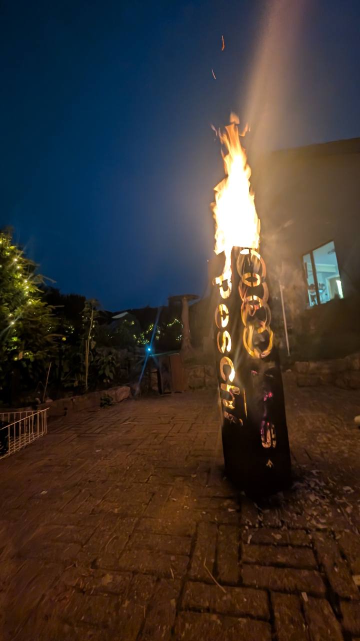 Feuertonne Wunschlogo bei Abendlicht
