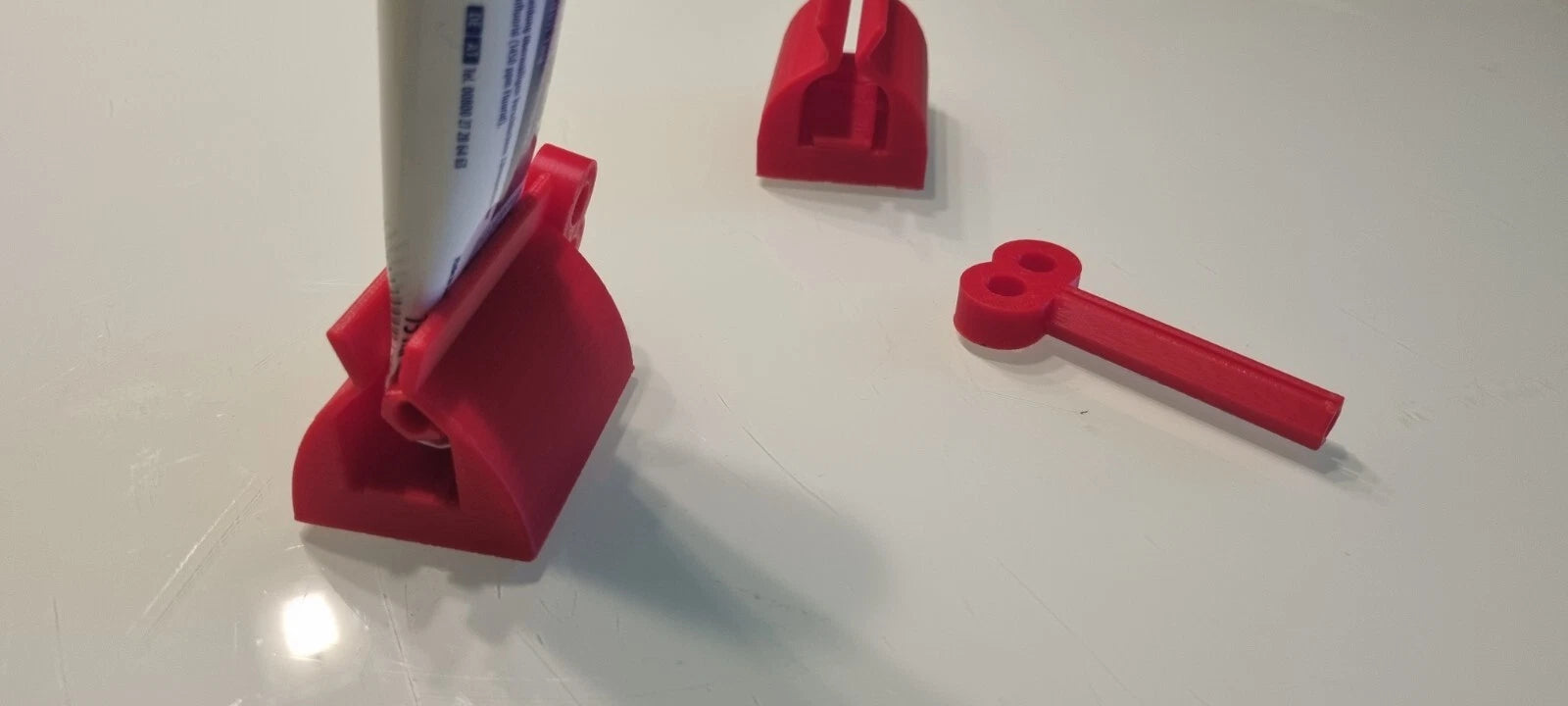 Zahnpasta Quetscher Tubendrücker Spender - Bild 1